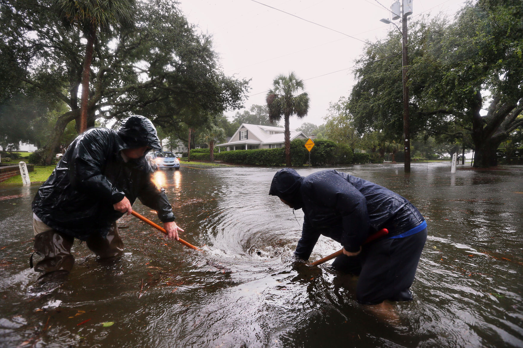PRINT TUESDAY clearing drain storm hurricane irma.jpg